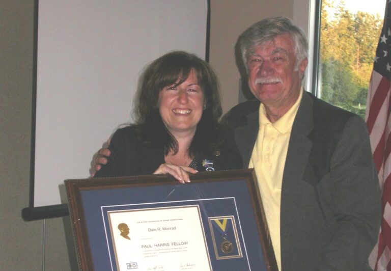 Beverlee Rasmussen with her father in a story about gender equality in business coaching.