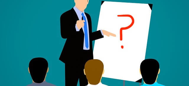 Business Coach showing a Question Mark