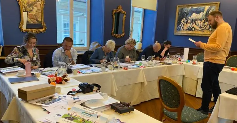 people sitting around a table for small business consultation