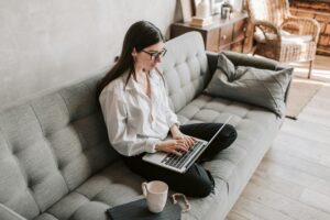 Remote business owner leading a virtual team and building successful work habits.