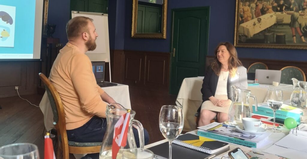 Small Business Coach Training students in Lithuania participating in ICF-accredited coach training